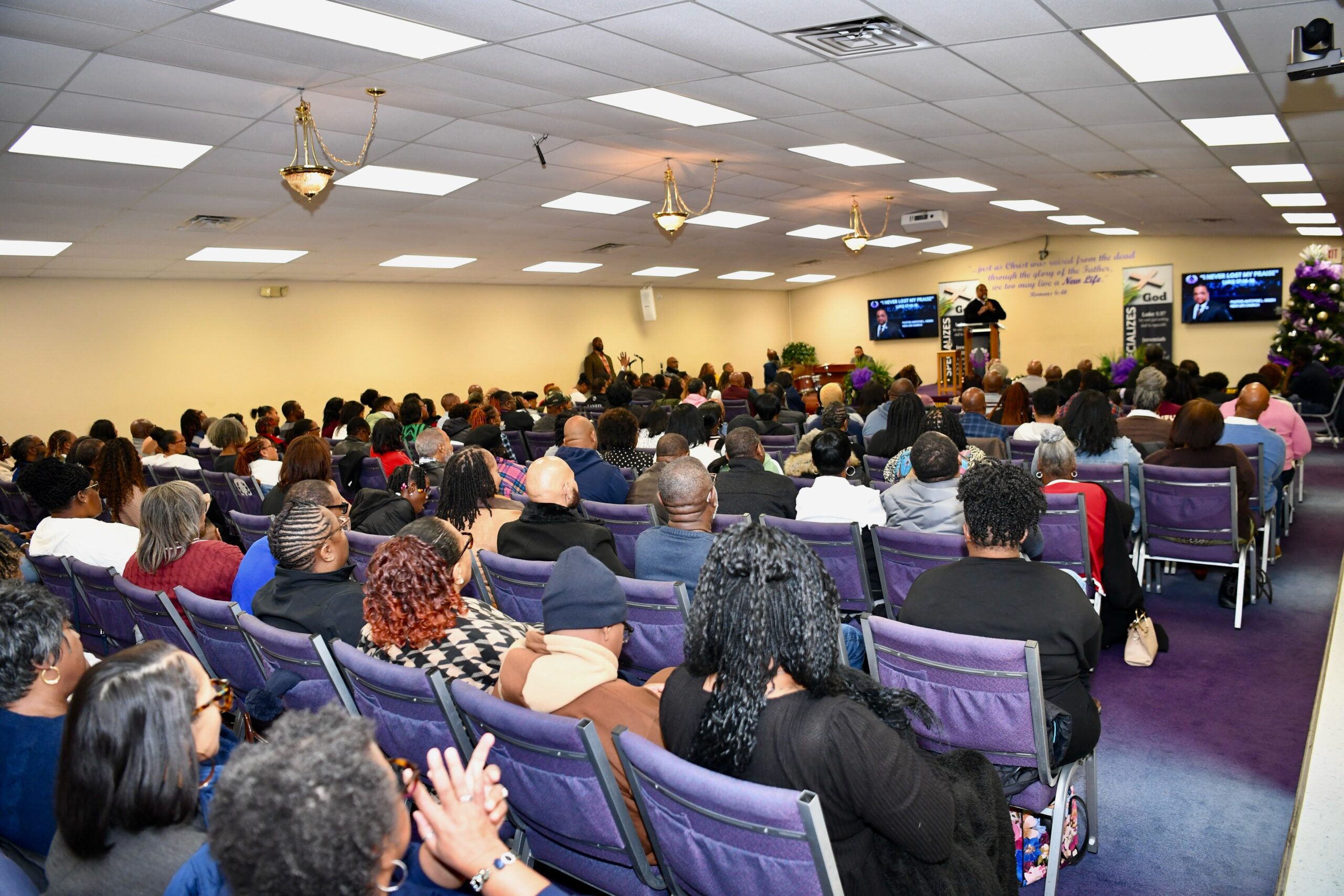 New Life Church congregation enjoying fellowship together