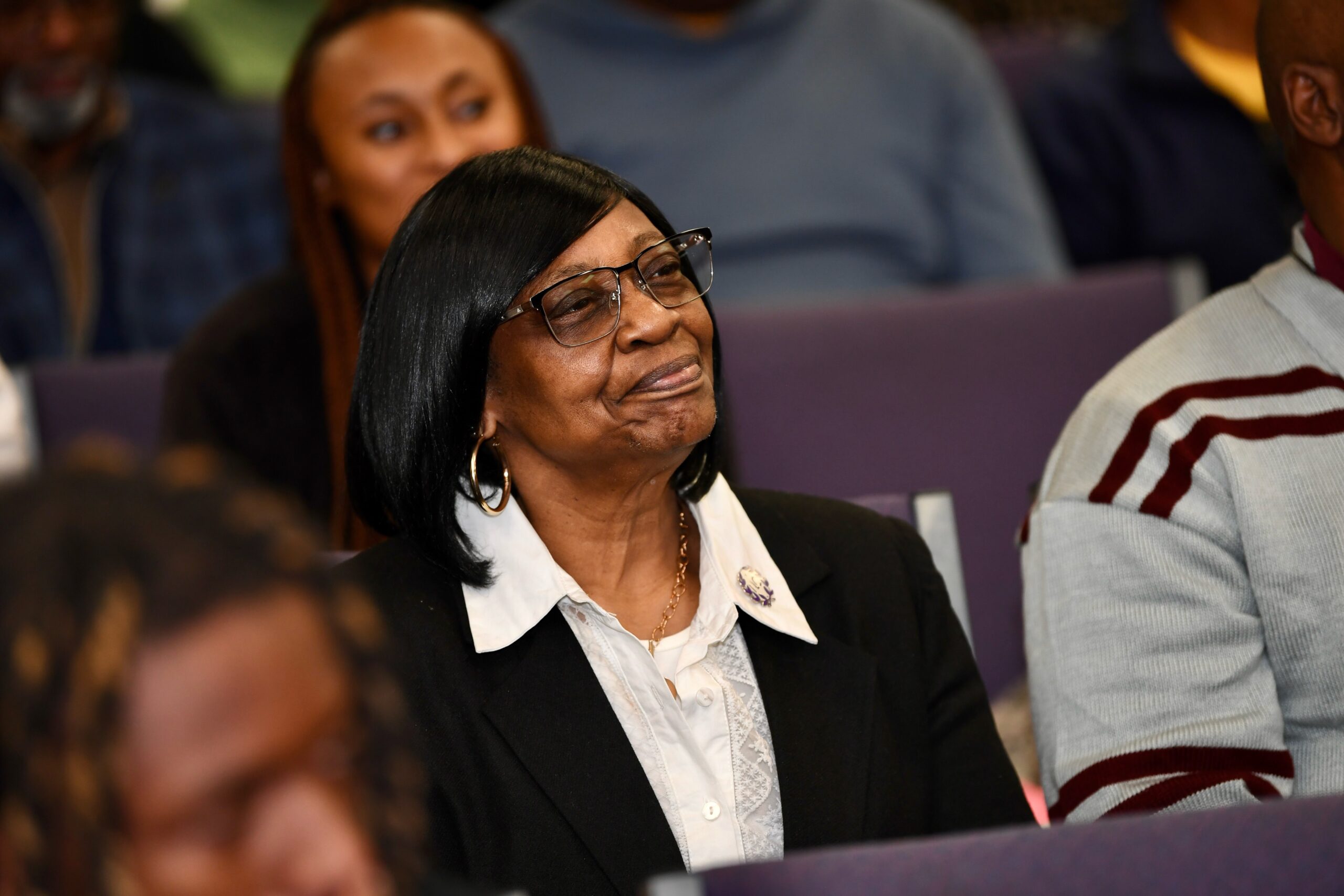 Congregation member smiling during service